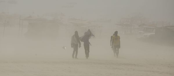 Indians walk on the banks of the river Ganges during a dust storm in Allahabad, India (File) Indians walk on the banks of the river Ganges during a dust storm in Allahabad, India (File) - Sputnik International