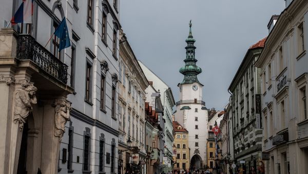 The street leading to Michael’s Gate in Bratislava, Slovakia is a medieval city gate that has been preserved and it ranks among the oldest town buildings. At the top of the tower is a statue of the archangel Michael, slaying a dragon. - Sputnik International