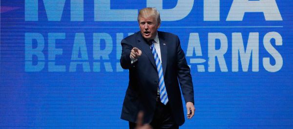 U.S. President Donald Trump gestures after speaking at a National Rifle Association (NRA) convention in Dallas, Texas, U.S. May 4, 2018 U.S. President Donald Trump gestures after speaking at a National Rifle Association (NRA) convention in Dallas, Texas, U.S. May 4, 2018 - Sputnik International