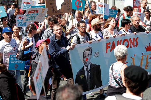 Demonstrators march during an anti-Macron festive protest called by far-left opposition France Insoumise (France Unbowed) political party two days ahead of the first anniversary of his election as President, in Paris, France, May 5, 2018 - Sputnik International