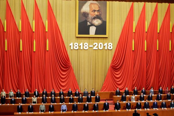Chinese President Xi Jinping and other officials sing the national anthem at an event commemorating the 200th birth anniversary of Karl Marx, in Beijing, China May 4, 2018 Chinese President Xi Jinping and other officials sing the national anthem at an event commemorating the 200th birth anniversary of Karl Marx, in Beijing, China May 4, 2018 - Sputnik International