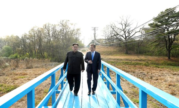 South Korean President Moon Jae-in and North Korean leader Kim Jong Un walk together at the truce village of Panmunjom inside the demilitarized zone separating the two Koreas, South Korea, April 27, 2018 South Korean President Moon Jae-in and North Korean leader Kim Jong Un walk together at the truce village of Panmunjom inside the demilitarized zone separating the two Koreas, South Korea, April 27, 2018 - Sputnik International