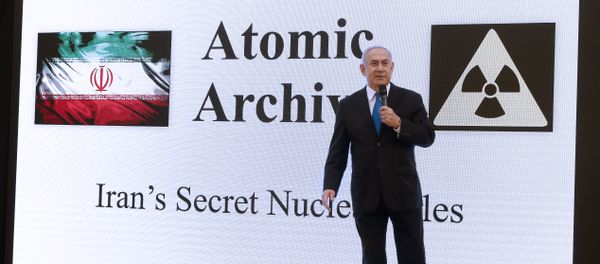 Israeli Prime Minister Benjamin Netanyahu delivers a speech on Iran's nuclear program at the defence ministry in Tel Aviv on April 30, 2018. Israeli Prime Minister Benjamin Netanyahu delivers a speech on Iran's nuclear program at the defence ministry in Tel Aviv on April 30, 2018. - Sputnik International
