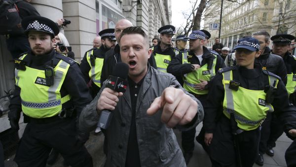 (File) Stephen Christopher Yaxley-Lennon, AKA Tommy Robinson, former leader of the right-wing EDL (English Defence League) is escorted away by police from a Britain First march and an English Defence League march in central London on April 4, 2017 - Sputnik International