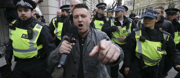 (File) Stephen Christopher Yaxley-Lennon, AKA Tommy Robinson, former leader of the right-wing EDL (English Defence League) is escorted away by police from a Britain First march and an English Defence League march in central London on April 4, 2017 - Sputnik International