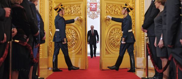 President-elect Vladimir Putin, center, enters St Andrew Hall of the Grand Kremlin Palace during the inauguration ceremony. File photo - Sputnik International