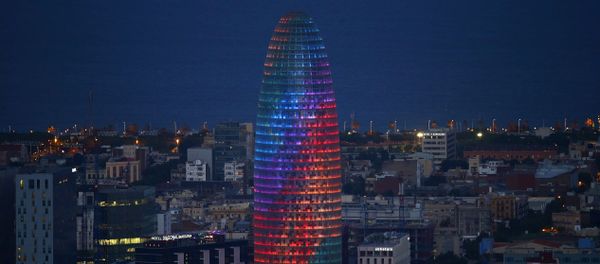 The Agbar tower is illuminated with gay pride rainbow during World Pride in Barcelona, Spain, Wednesday, June 28, 2017 - Sputnik International