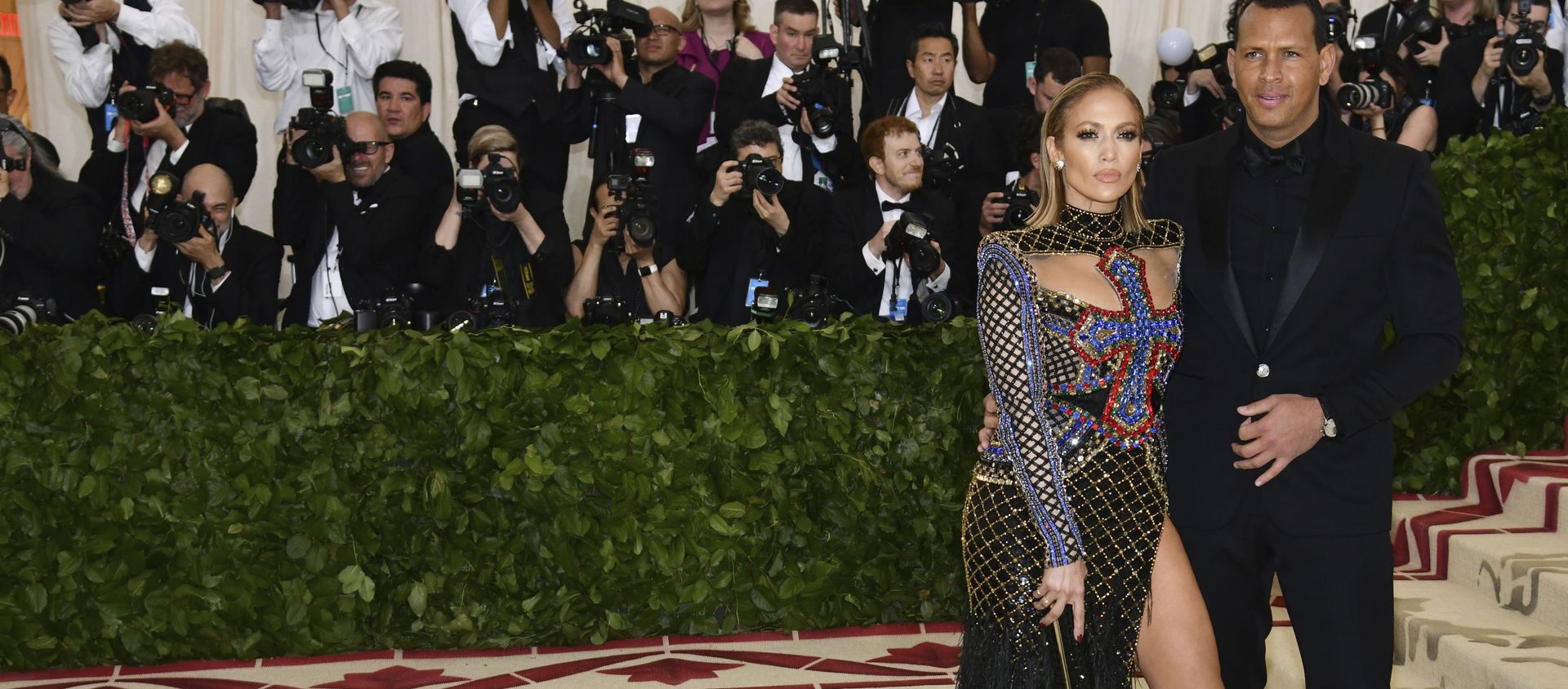 Jennifer Lopez, left, and Alex Rodriguez attend The Metropolitan Museum of Art's Costume Institute benefit gala celebrating the opening of the Heavenly Bodies: Fashion and the Catholic Imagination exhibition on Monday, May 7, 2018, in New York.  - Sputnik International, 1920, 13.03.2021