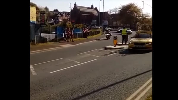 Cycling Crew Car Takes out Pedestrian Island - Sputnik International