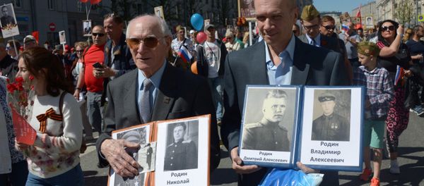 Participants of the action An immortal regiment in Moscow Participants of the action An immortal regiment in Moscow - Sputnik International