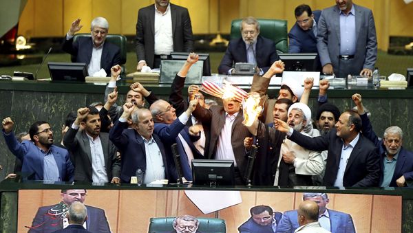 Iranian lawmakers set fire on JCPOA, US flag after Trump’s exit from Iran deal - Sputnik International
