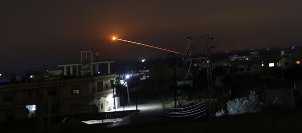 Missile fire is seen over Daraa, Syria May 10, 2018 - Sputnik International