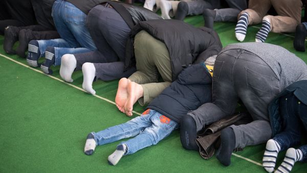 Muslims pray at a makeshift mosque in Potsdam near Berlin, northeastern Germany, on March 16, 2018 - Sputnik International