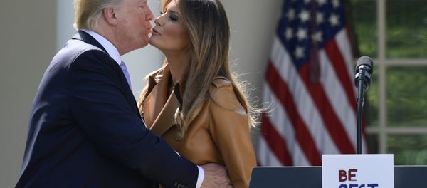 President Donald Trump kisses first lady Melania Trump following an event where Melania Trump announced her initiatives in the Rose Garden of the White House in Washington, Monday, May 7, 2018 - Sputnik International