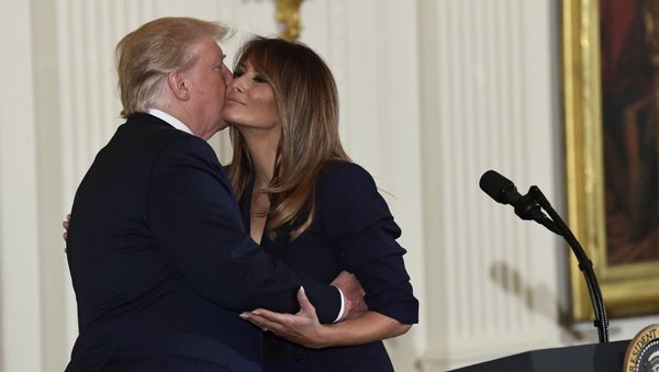 President Donald Trump kisses first lady Melania Trump during a celebration of military mothers and spouses event in the East Room of the White House in Washington, Wednesday, May 9, 2018 President Donald Trump kisses first lady Melania Trump during a celebration of military mothers and spouses event in the East Room of the White House in Washington, Wednesday, May 9, 2018 - Sputnik International