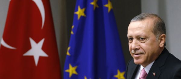 Turkish President Recep Tayyip Erdogan waits for the arrival of European Council President Donald Tusk prior to a meeting at the EU Council building in Brussels on Monday, Oct. 5, 2015. - Sputnik International