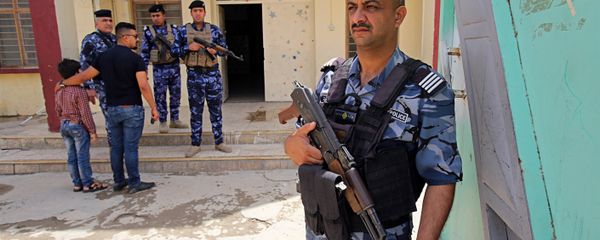 In this Wednesday, May 9, 2018 photo, Iraqi security forces guard a polling station in Baghdad, Iraq In this Wednesday, May 9, 2018 photo, Iraqi security forces guard a polling station in Baghdad, Iraq - Sputnik International