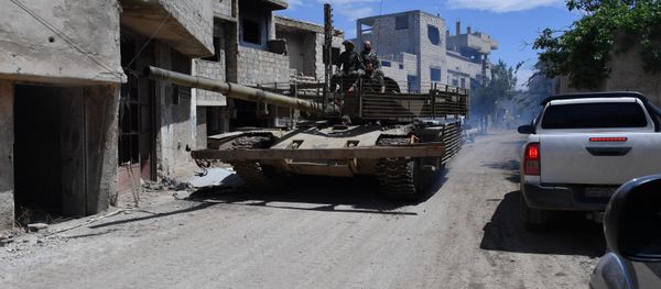 A T-55 tank in the area of the former Palestinian refugee camp Yarmouk in the southern suburb of Damascus - Sputnik International