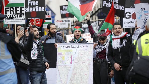 (File) Protesters hold up a map along with Palestinian flags and placards during a demonstration on Whitehall opposite Downing Street in central London on April 7, 2018 in support of the Palestianians in the Gaza Strip (File) Protesters hold up a map along with Palestinian flags and placards during a demonstration on Whitehall opposite Downing Street in central London on April 7, 2018 in support of the Palestianians in the Gaza Strip - Sputnik International