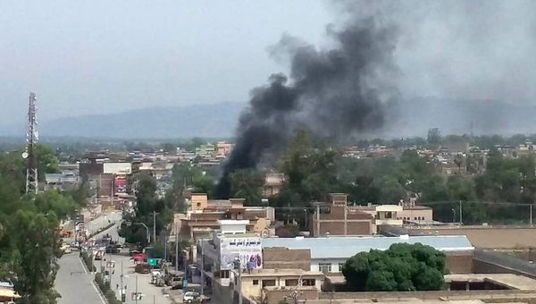 Smoke rises from the site of a blast and gunbattle between Afghan security forces and a handful of militants in Jalalabad city, Afghanistan May 13, 2018 - Sputnik International
