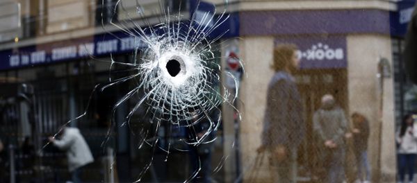 A bullet hole seen on the window of a cafe located near the area where the assailant of a knife attack was shot dead by police officers, in central Paris, Sunday May 13, 2018 A bullet hole seen on the window of a cafe located near the area where the assailant of a knife attack was shot dead by police officers, in central Paris, Sunday May 13, 2018 - Sputnik International