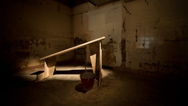 An artwork entitled 'Waterboarding' by artist Steve Lazarides is pictured during a photocall for the exhibition 'Brutal' at the Lazarides Gallery in London, on October 14, 2013 - Sputnik International