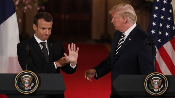 French President Emmanuel Macron waves to someone in the crowd as he and U.S. President Donald Trump conclude their joint news conference in the East Room of the White House in Washington, U.S., April 24, 2018 French President Emmanuel Macron waves to someone in the crowd as he and U.S. President Donald Trump conclude their joint news conference in the East Room of the White House in Washington, U.S., April 24, 2018 - Sputnik International
