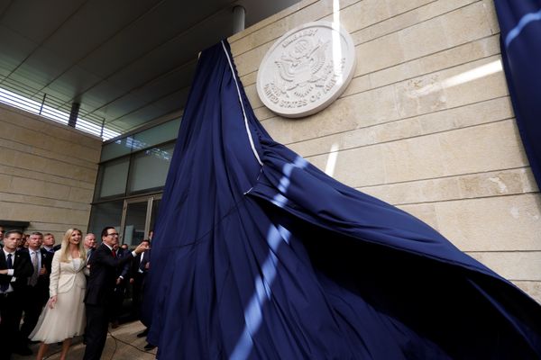 U.S. Treasury Secretary Steven Mnuchin unveils the seal for the new U.S. embassy, as he stands next to Senior White House Adviser Ivanka Trump during the dedication ceremony of the new U.S. embassy in Jerusalem, May 14, 2018 - Sputnik International