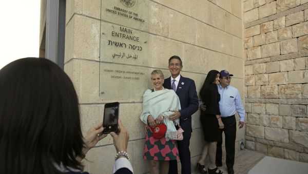 Visitors have a photo taken at the entrance to the new U.S. Embassy in Jerusalem, Monday, May 14, 2018 Visitors have a photo taken at the entrance to the new U.S. Embassy in Jerusalem, Monday, May 14, 2018 - Sputnik International