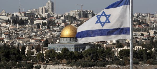 The Israeli flag flutters in front of the Dome of the Rock mosque and the city of Jerusalem, on December 1, 2017 The Israeli flag flutters in front of the Dome of the Rock mosque and the city of Jerusalem, on December 1, 2017 - Sputnik International