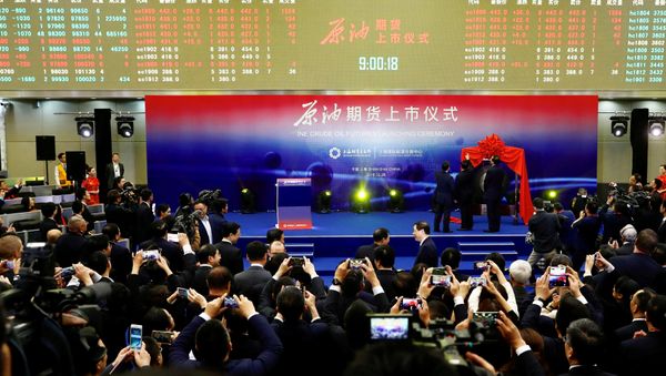 People attend the launch ceremony of Shanghai crude oil futures at the Shanghai International Energy Exchange (INE) in Shanghai, China March 26, 2018 People attend the launch ceremony of Shanghai crude oil futures at the Shanghai International Energy Exchange (INE) in Shanghai, China March 26, 2018 - Sputnik International