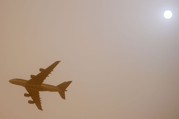 A plane flying over the capital city of Doha, Qatar. A plane flying over the capital city of Doha, Qatar. - Sputnik International