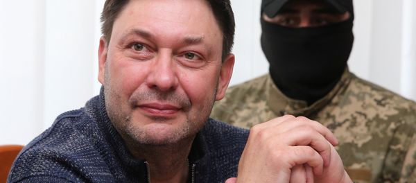 Journalist Kirill Vyshinsky, the director of Russian state news agency RIA Novosti Ukraine, attends a preliminary court hearing in Kherson, Ukraine May 17, 2018 Journalist Kirill Vyshinsky, the director of Russian state news agency RIA Novosti Ukraine, attends a preliminary court hearing in Kherson, Ukraine May 17, 2018 - Sputnik International