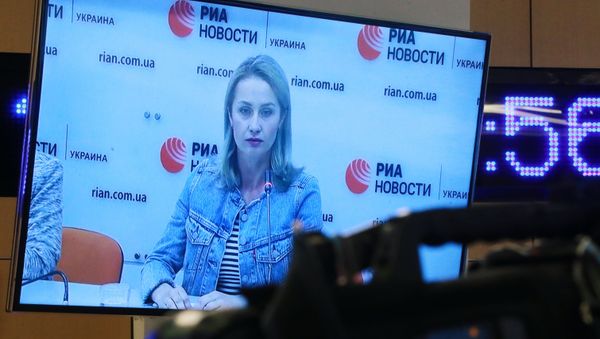 Irina Vyshinskaya, the wife of journalist Kirill Vyshinsky, during a press videoconference in Moscow and Kiev Irina Vyshinskaya, the wife of journalist Kirill Vyshinsky, during a press videoconference in Moscow and Kiev - Sputnik International