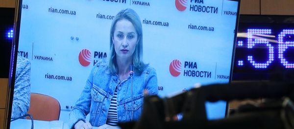 Irina Vyshinskaya, the wife of journalist Kirill Vyshinsky, during a press videoconference in Moscow and Kiev - Sputnik International