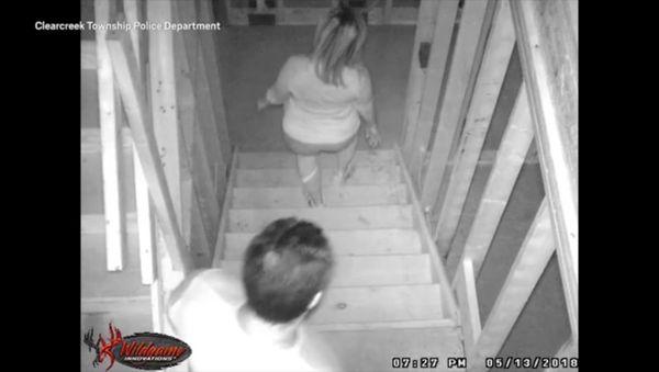 A man and woman are accused of repeatedly trespassing in a luxury house that is under construction to take a poop - Sputnik International