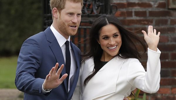 Britain's Prince Harry and his fiancee Meghan Markle pose for photographers during a photocall in the grounds of Kensington Palace in London, Monday Nov. 27, 2017 - Sputnik International
