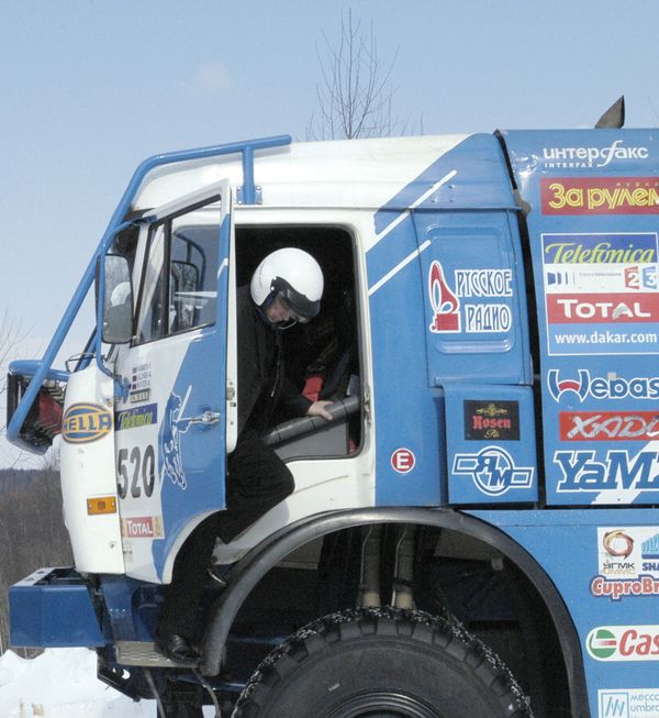 Russian President Vladimir Putin at the Central Automobile Proving Ground in Dmitrov, where he drove a KAMAZ for several hundred meters - Sputnik International