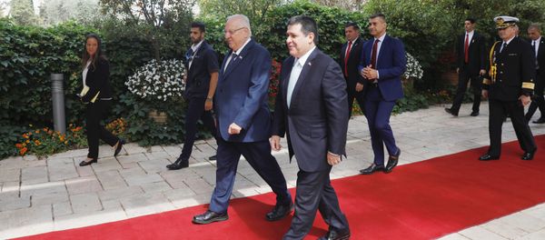 Paraguayan President Horacio Cartes walks next to Israeli President Reuven Rivlin upon his arrival for a meeting at the Israeli president's residence in Jerusalem, ahead of the dedication ceremony of the embassy of Paraguay in Jerusalem, May 21, 2018 Paraguayan President Horacio Cartes walks next to Israeli President Reuven Rivlin upon his arrival for a meeting at the Israeli president's residence in Jerusalem, ahead of the dedication ceremony of the embassy of Paraguay in Jerusalem, May 21, 2018 - Sputnik International