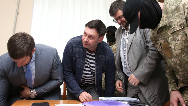 Journalist Kirill Vyshinsky, the director of Russian state news agency RIA Novosti Ukraine, attends a preliminary court hearing in Kherson, Ukraine May 17, 2018 Journalist Kirill Vyshinsky, the director of Russian state news agency RIA Novosti Ukraine, attends a preliminary court hearing in Kherson, Ukraine May 17, 2018 - Sputnik International
