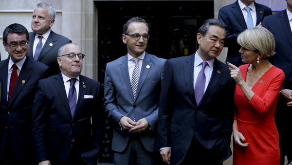Argentina's Foreign Secretary Jorge Faurie, second from left, Germany's Foreign Minister Heiko Maas, third from left, China's Foreign Minister Wang Yi, second from right, and Australia's Foreign Affairs Minister Julie Bishop talk before the group picture during the G20 foreign ministers meeting at San Martin Palace in Buenos Aires, Argentina, Monday, May 21, 2018 - Sputnik International