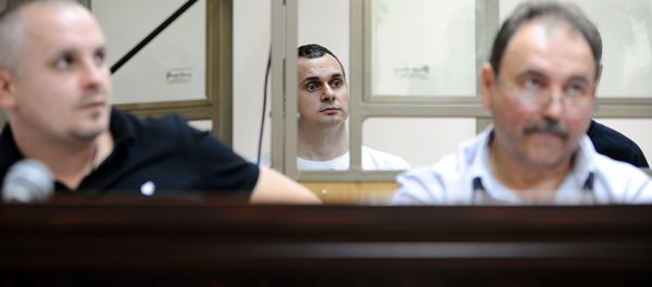 The Ukrainian film-maker Oleg Sentsov (center) seen in the North-Caucasian District Military courtroom, Rostov-on-Don, the venue of initial hearings on the acts of terrorism in Crimea The Ukrainian film-maker Oleg Sentsov (center) seen in the North-Caucasian District Military courtroom, Rostov-on-Don, the venue of initial hearings on the acts of terrorism in Crimea - Sputnik International