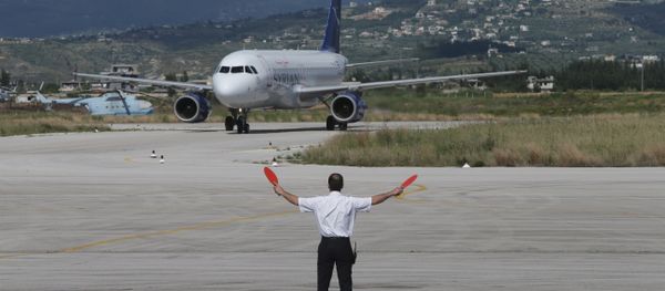 A SyrianAir passenger plane taxis at Latakia airport on Syria's northwestern Mediterranean coast (File) A SyrianAir passenger plane taxis at Latakia airport on Syria's northwestern Mediterranean coast (File) - Sputnik International