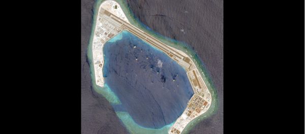 Satellite photo dated March 20, 2018 shows Subi Reef. Satellite photo dated March 20, 2018 shows Subi Reef. - Sputnik International