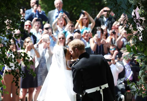Britain's Prince Harry kisses his wife Meghan after wedding ceremony Britain's Prince Harry kisses his wife Meghan after wedding ceremony - Sputnik International
