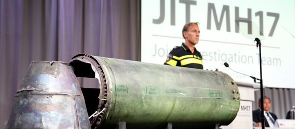 A damaged missile is displayed during a news conference by members of the Joint Investigation Team, comprising the authorities from Australia, Belgium, Malaysia, the Netherlands and Ukraine who present interim results in the ongoing investigation of the 2014 MH17 crash that killed 298 people over eastern Ukraine, in Bunnik, Netherlands, May 24, 2018 A damaged missile is displayed during a news conference by members of the Joint Investigation Team, comprising the authorities from Australia, Belgium, Malaysia, the Netherlands and Ukraine who present interim results in the ongoing investigation of the 2014 MH17 crash that killed 298 people over eastern Ukraine, in Bunnik, Netherlands, May 24, 2018 - Sputnik International