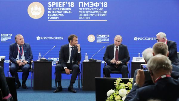 President of Russia Vladimir Putin and President of France Emmanuel Macron, second, left, during Russia-France Business Dialogue held as part of the St. Petersburg International Economic Forum. Left: President of the Movement of the Enterprises of France (MEDEF) Pierre Gattaz. President of Russia Vladimir Putin and President of France Emmanuel Macron, second, left, during Russia-France Business Dialogue held as part of the St. Petersburg International Economic Forum. Left: President of the Movement of the Enterprises of France (MEDEF) Pierre Gattaz. - Sputnik International