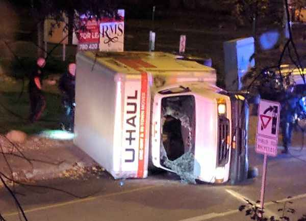 A rental truck lies on its side in Edmonton, Canada, on October 1, 2017, after a high speed chase A rental truck lies on its side in Edmonton, Canada, on October 1, 2017, after a high speed chase - Sputnik International
