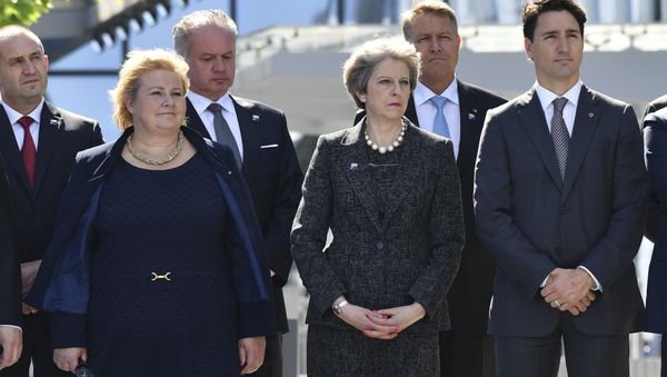 Norway's Prime Minister Erna Solberg, British Prime Minister Theresa May, Canadian Prime Minister Justin Trudeau, from left, look on as U.S. President Donald Trump speaks during ceremony at NATO headquarters at the NATO summit in Brussels on Thursday, May 25, 2017. - Sputnik International