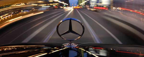 The star emblem on the hood of a driving Mercedes-Benz is seen near Potsdam Square, Potsdamer Platz, in Berlin The star emblem on the hood of a driving Mercedes-Benz is seen near Potsdam Square, Potsdamer Platz, in Berlin - Sputnik International
